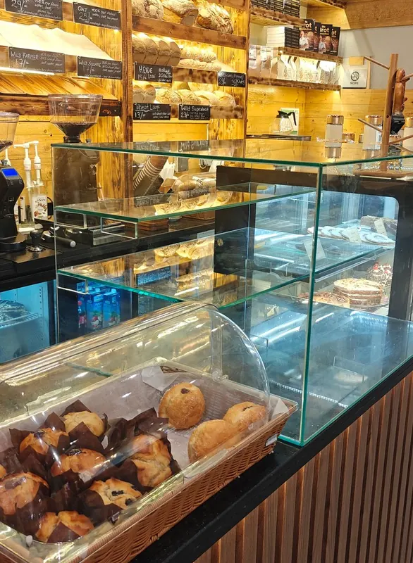 Glass display counters with pastries and baked goods at Svan's Baker's Kitchen